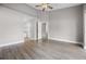Open concept living room with high ceilings and neutral color palette at 440 Peppermill Cir, Kissimmee, FL 34758