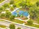 A view of the community playground featuring climbing structures, slides, and swings at 440 Peppermill Cir, Kissimmee, FL 34758