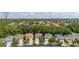 Aerial view showcases the home's proximity to the Walt Disney World Resort Area, highlighting the neighborhood and amenities at 4697 Golden Beach Ct, Kissimmee, FL 34746