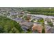 Beautiful aerial view of a neighborhood with a large lake in the background at 4697 Golden Beach Ct, Kissimmee, FL 34746