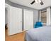 Bedroom featuring a ceiling fan, window with blinds, closet and doorway leading into another room at 4697 Golden Beach Ct, Kissimmee, FL 34746