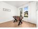 Bright game room featuring a foosball table and natural light at 4697 Golden Beach Ct, Kissimmee, FL 34746
