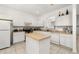 Functional kitchen with an island, ample counter space, and modern appliances at 4697 Golden Beach Ct, Kissimmee, FL 34746