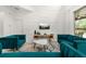 Charming living area with modern decor, a TV, and plush seating, ideal for entertaining at 4697 Golden Beach Ct, Kissimmee, FL 34746