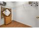 Walk-in closet with wire shelving and a decorative bamboo framed mirror at 4697 Golden Beach Ct, Kissimmee, FL 34746