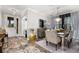 Chic dining room featuring modern chandelier lighting and elegant decor at 4952 Creekside Park Ave, Orlando, FL 32811