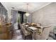 Stylish dining area showcases a modern table setting and sleek design at 4952 Creekside Park Ave, Orlando, FL 32811