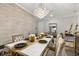 Bright dining room featuring stylish decor and a modern chandelier at 4952 Creekside Park Ave, Orlando, FL 32811