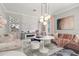 Comfortable living room with modern fireplace, stylish decor, and plenty of seating at 4952 Creekside Park Ave, Orlando, FL 32811