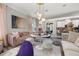 Open-concept living area with modern decor, stylish lighting, and comfortable seating at 4952 Creekside Park Ave, Orlando, FL 32811
