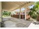 Covered carport featuring brick walls and an open-air design at 550 Lake Otis Se Dr, Winter Haven, FL 33880