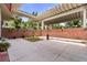 Enclosed courtyard featuring red brick wall, concrete flooring, and modern heater at 550 Lake Otis Se Dr, Winter Haven, FL 33880
