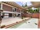 Exterior view of courtyard with pool and clear view of living area at 550 Lake Otis Se Dr, Winter Haven, FL 33880