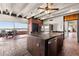 Modern kitchen features granite countertops, stainless steel appliances, and a water view at 550 Lake Otis Se Dr, Winter Haven, FL 33880