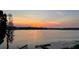Beautiful lake view at sunset, showcasing the property's serene and picturesque setting at 550 Lake Otis Se Dr, Winter Haven, FL 33880