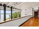 Bright loft with hardwood floors and expansive windows overlooking the lake at 550 Lake Otis Se Dr, Winter Haven, FL 33880