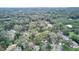 Aerial view of the property showcasing lush tree coverage and neighborhood at 655 Vine Ct, Apopka, FL 32703