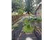 View of a backyard with weed control fabric and a wooden fence, ready for new landscaping at 655 Vine Ct, Apopka, FL 32703