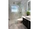 Stylish bathroom featuring marble-look floors, a glass shower, and a vessel sink at 655 Vine Ct, Apopka, FL 32703