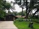Charming single-story home with a well-manicured front yard and mature trees offering plenty of shade at 655 Vine Ct, Apopka, FL 32703