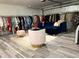 Unique boutique-style clothing rack and trendy seating, perfect for a hip interior concept at 655 Vine Ct, Apopka, FL 32703