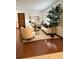 Comfortable living room with cozy seating and decor, bright lighting, and hardwood floors creating a relaxing atmosphere at 655 Vine Ct, Apopka, FL 32703