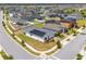 Aerial view of home with solar panels situated on a corner lot within a residential neighborhood at 6651 Syreeta Ln, Harmony, FL 34773