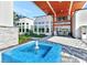 Welcoming entrance with a modern fountain and clean architectural lines at 7773 Spectrum Dr, Reunion, FL 34747