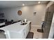 Modern kitchen featuring a large island, stainless steel appliances, and stylish countertops for culinary enthusiasts at 7773 Spectrum Dr, Reunion, FL 34747