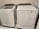 A new Samsung washer and dryer set inside the home's laundry room at 7773 Spectrum Dr, Reunion, FL 34747
