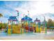 Community water park area features colorful slides and splash zones at 7773 Spectrum Dr, Reunion, FL 34747