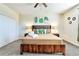 This bedroom features a wooden bed frame with tropical themed decorations and a ceiling fan at 8974 Cabot Cliffs Dr, Davenport, FL 33896