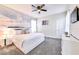 Charming bedroom with an accent wall and neutral-toned decor at 8974 Cabot Cliffs Dr, Davenport, FL 33896