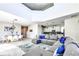Spacious living room with open floor plan, seamlessly connecting the kitchen and dining areas at 8974 Cabot Cliffs Dr, Davenport, FL 33896