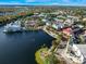 Gorgeous aerial view of a lakeside community with colorful buildings and lush landscaping at 920 Spring Park St # 301, Celebration, FL 34747