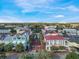 Attractive aerial view of town with colorful buildings, green trees and holiday decorations at 920 Spring Park St # 301, Celebration, FL 34747