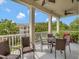 Balcony with wicker furniture, providing a comfortable outdoor retreat at 920 Spring Park St # 301, Celebration, FL 34747