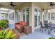 Relaxing balcony with comfortable seating perfect for enjoying the outdoors at 920 Spring Park St # 301, Celebration, FL 34747