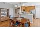 Open concept dining room adjoins a modern kitchen with stainless steel appliances at 920 Spring Park St # 301, Celebration, FL 34747