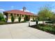 Well-maintained building with red tile roof and landscaped walkway leading to entrance at 920 Spring Park St # 301, Celebration, FL 34747