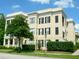 Well-maintained multi-story residential building with classic architectural details and mature trees at 920 Spring Park St # 301, Celebration, FL 34747