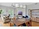 Spacious living room open to the kitchen, featuring hardwood floors and stylish furnishings at 920 Spring Park St # 301, Celebration, FL 34747