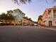 Charming street view lined with shops and restaurants, creating a vibrant community atmosphere at 920 Spring Park St # 301, Celebration, FL 34747