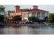 Expansive waterfront view of colorful buildings along the water in a lively town with many amenities at 920 Spring Park St # 301, Celebration, FL 34747