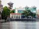 Scenic waterfront view highlighting the neighborhood's architectural charm and waterfront ambiance for relaxing activities at 920 Spring Park St # 301, Celebration, FL 34747