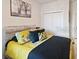 A beautifully appointed bedroom features a comfortable bed with stylish bedding and decorative pillows at 1895 Spring Shower Cir, Kissimmee, FL 34744