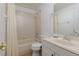 Cozy bathroom with neutral walls, bath and shower combo, and tiled flooring at 1236 Aquila Loop, Celebration, FL 34747