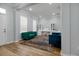 Bright living room featuring modern furniture, hardwood floors, and a welcoming atmosphere at 1236 Aquila Loop, Celebration, FL 34747