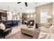 Spacious living room with stylish decor connected to modern kitchen with island seating at 1592 Castile St, Celebration, FL 34747