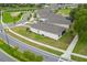 Aerial view of a home on a corner lot with lush landscaping at 1598 Whitewood Ct, Kissimmee, FL 34747
